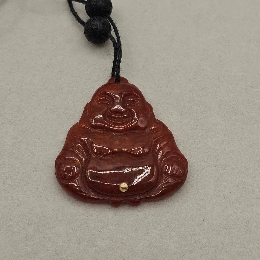 Carved Red Stone Laughing Buddha Pendant Black Cord Necklace Gold Tone Accent